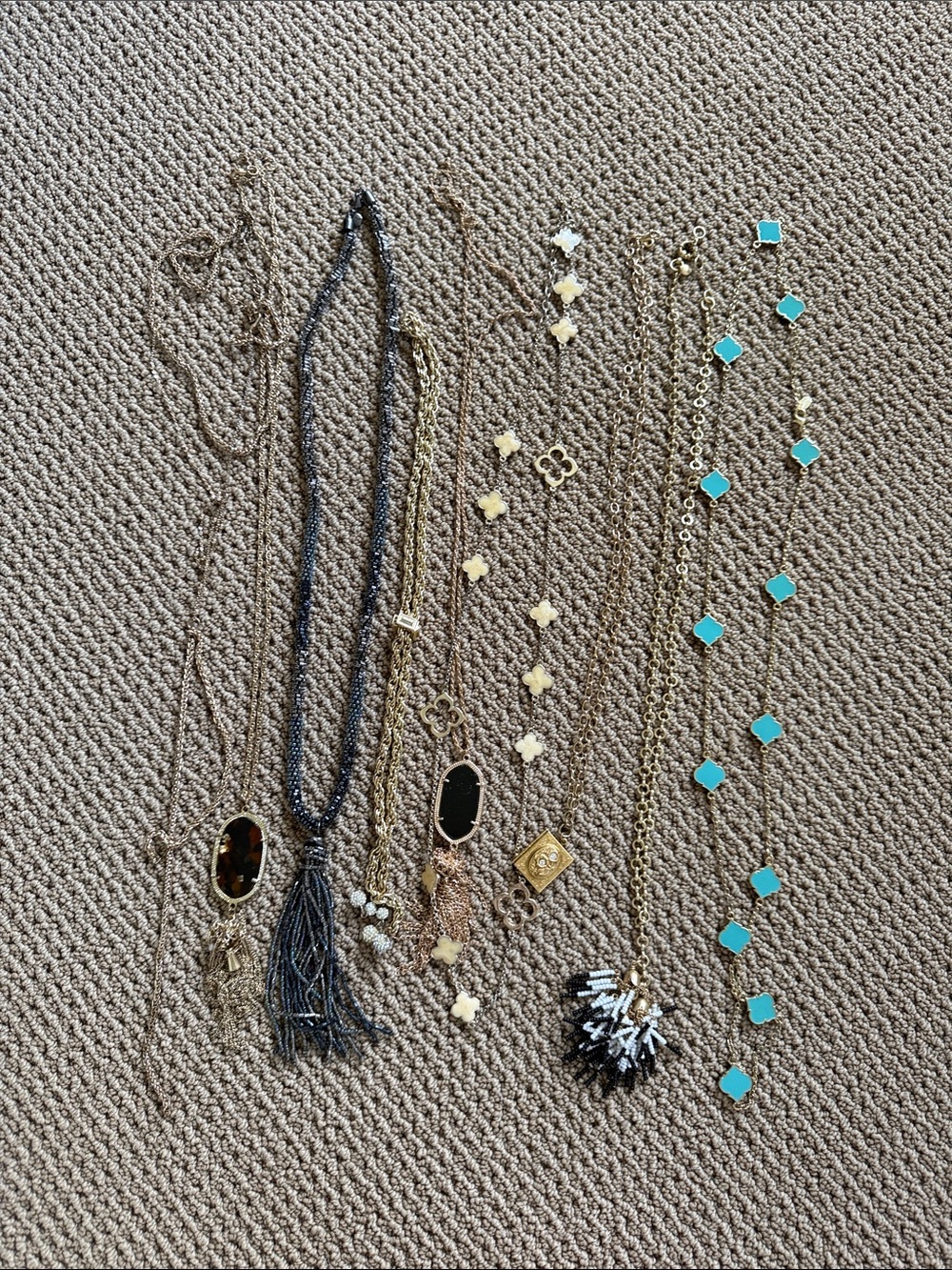 Lot of 8 costume jewelry necklaces. Assorted brands.